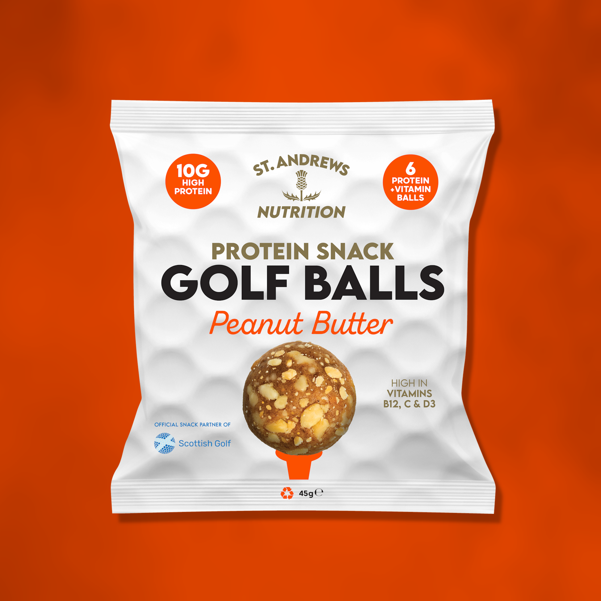 Protein snack golf balls packaging with St. Andrews Nutrition branding on an orange background